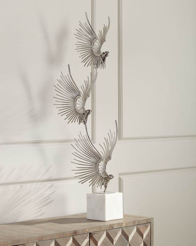 Sculpted Birds In Flight